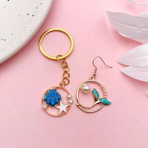 Ocean theme keychain and earring set with mermaid tail, starfish and shell charms