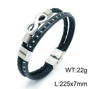 Detailed view of black multi-layer leather bracelet with silver infinity symbol and stud