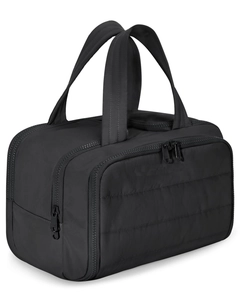 Detail of black quilted nylon travel toiletry bag featuring double zippers and carry handle
