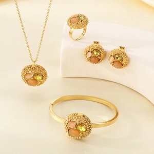 Detailed set of 18K gold plated jewelry with round pendants and colorful crystals