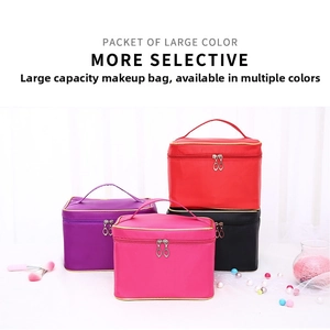 Stack of colorful large capacity satin makeup bags in red, purple, pink and black