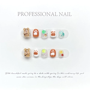 Kids press-on nail kit featuring 10 handmade pieces with 3D bears and cute charms