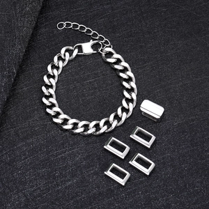 Detailed view of silver stainless steel Cuban link bracelet with rectangle metal plates
