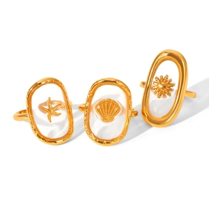 Gold stainless steel oval ring set featuring starfish and seashell resin details