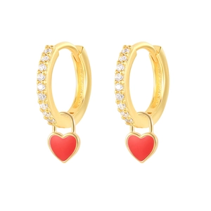 Macro detail of gold-plated hoop earrings featuring red enamel heart lock and white zircon