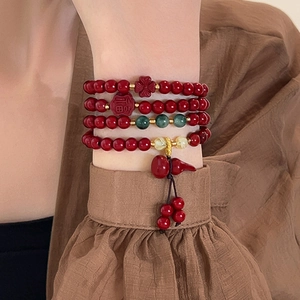 Multi-layer red beaded bracelet with Fu character charm and gourd pendant in retro style