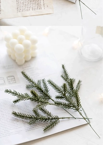 Detailed view of deep green artificial pine needles for Christmas wreath DIY and decor