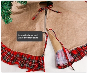 Detail of red and green plaid bow ties on a vintage burlap Christmas tree skirt