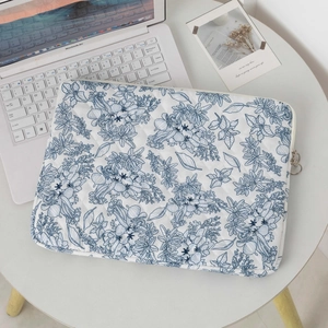 Floral quilted laptop sleeve in blue heart pattern for 11 to 15 inch tablets