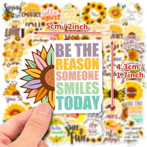 Detail shot of a sunflower sticker with inspirational quote and precise dimensions