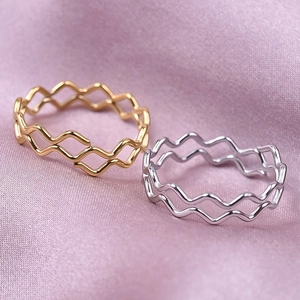 Minimalist 18K gold and silver wavy 304 stainless steel open rings on purple silk