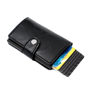 Close-up of black leather RFID wallet with card slots and silver snap button closure