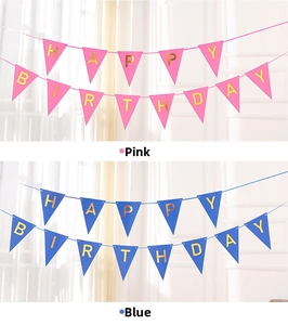 Macro detail of rose red and blue triangle banners with gold foil Happy Birthday letters