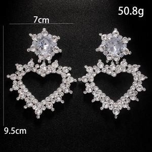 Clips d'oreilles cœur et étoile avec cristaux, finition argentée, 9,5 cm de long