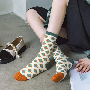 Women's argyle pattern knit crew socks with vintage geometric design in multi-color