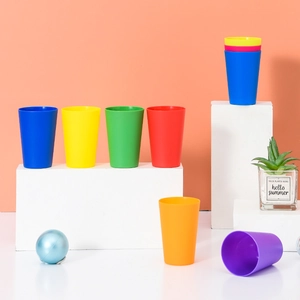 Colorful stacking cups for kids early education and stacking training on white stands