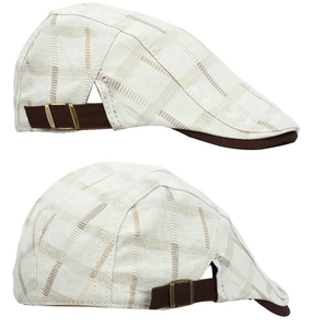 Detailed macro view of vintage plaid newsboy cap featuring fabric texture and metal buckle