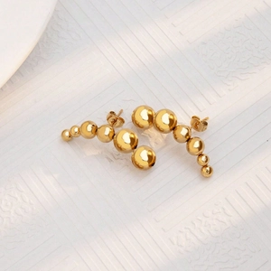 Minimalist gold-plated stainless steel curved ball earrings with a high-polished finish