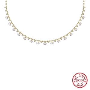 Détail du collier en argent sterling 925 avec perles et pendentifs en zircone