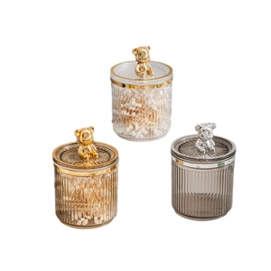 Three glass vanity jars with bear-shaped lids for cotton swabs and cosmetic storage