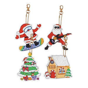 Close-up of four DIY Christmas diamond painting pendants with resin rhinestones and gold clips