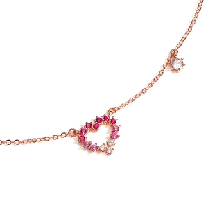 Elegant rose gold heart pendant necklace with pink gradient crystals for women