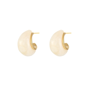 Detailed macro view of French style 18K gold plated teardrop earrings with cream resin