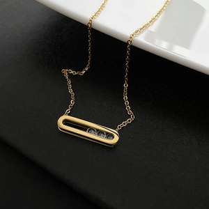 Gold-plated rectangle pendant necklace with three sliding zircon stones on a fine chain