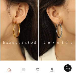 Detailed comparison of exaggerated large hoop earrings in textured gold and silver finishes