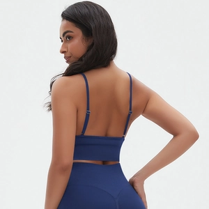 Detail of navy blue seamless sports bra back design with adjustable straps for fitness