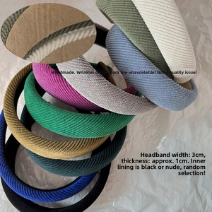 Detail view of colorful twill fabric headbands showing width 3cm and thickness 1cm