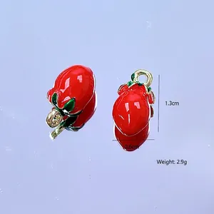 Macro view of red strawberry alloy pendant charms with dimensions and weight specs