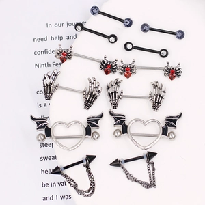 Gothic Halloween nipple ring set with black bat wings, skull hand and spider charms