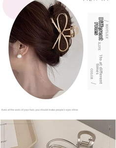 Detail of high-quality metallic bow hair claw clip in polished gold and silver finishes