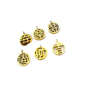 Macro shot of 18K gold plated stainless steel pendants with hollowed Chinese characters