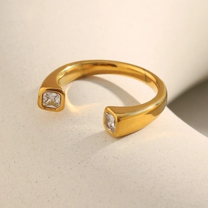 Macro shot of 18K gold plated stainless steel ring with dual square zircon stones