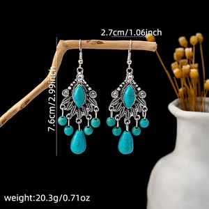 Detailed view of vintage silver earrings with blue turquoise and size dimensions