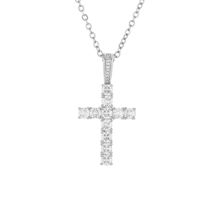 Detailed view of silver cross pendant featuring multi-stone zircon pavé settings on fine chain