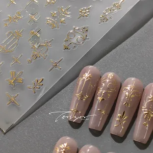 Macro detail of gold vintage star and constellation nail stickers on matte base