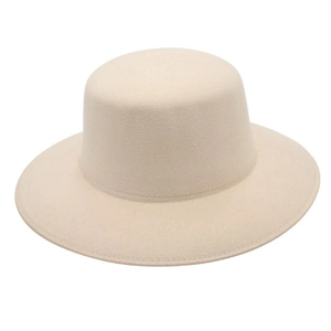 Detail view of beige wool felt fedora showing the smooth matte texture and wide brim