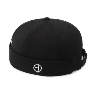 Classic black cotton docker hat with white cross embroidery and adjustable strap