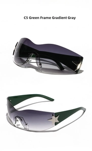 Detail view of Y2K rimless sunglasses with gradient grey lens and silver star accents