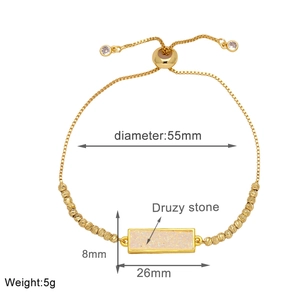 Macro detail of adjustable gold plated bracelet with 55mm diameter and druzy stone
