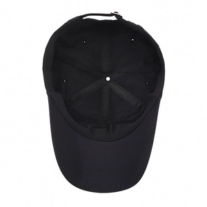 Interior view of black breathable baseball cap showing six-panel structure and metal buckle