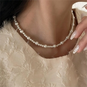 Elegant 925 sterling silver gradient pearl choker necklace on model neck