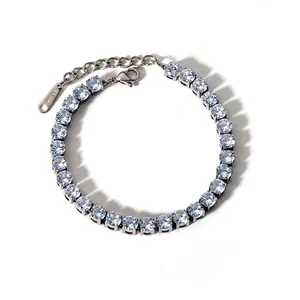Detail view of silver tennis bracelet showing lobster clasp, extender chain and 5mm zircon