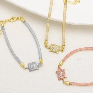Colorful turtle pendant bracelets in gold, silver, and rose gold with zircon stones