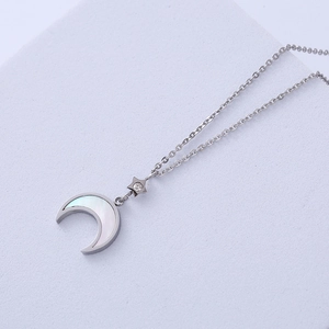 Minimalist stainless steel necklace with mother of pearl moon and star pendant