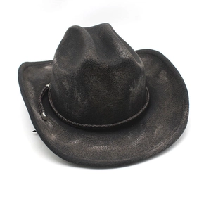 Detail of vintage distressed fedora hat with woven rope band and silver metal tips