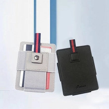 Close-up of gray and black faux leather card wallets with striped pull straps and fashion logo